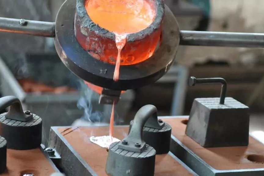 Metal die casting process showing mold filling with molten metal