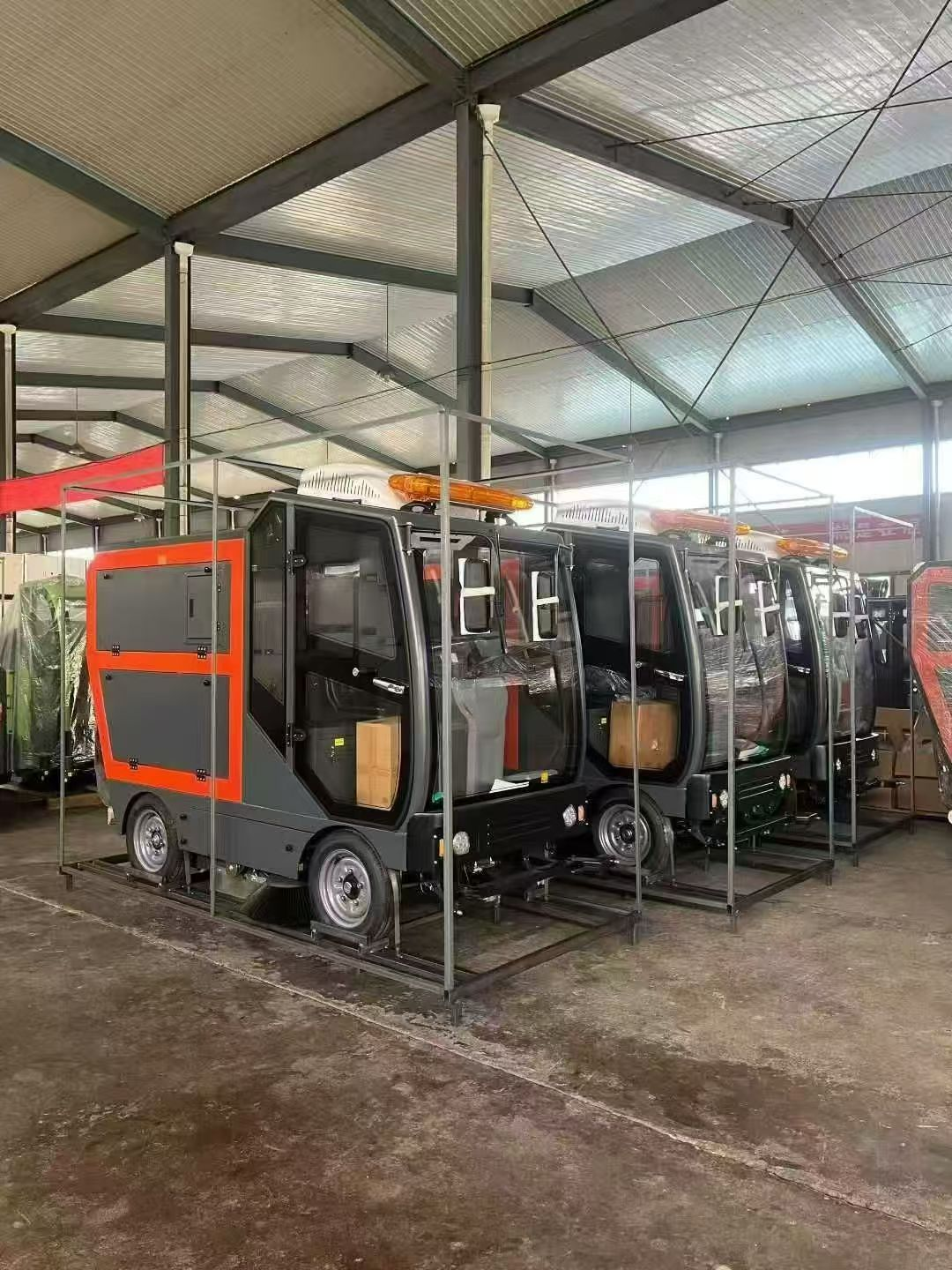 What are the uses of floor sweepers in factories?