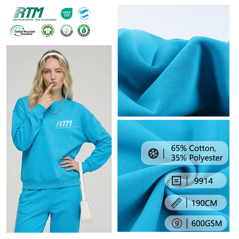 9914 - توريد مباشر من المصنع: نسيج تيري على شكل حراشف سمكية، محبوك دافئ مقاوم للكهرباء الساكنة، بوزن 600 غرام/م²، مزدوج الوجه ومتين، مكوّن من ٦٥٪ قطن و٣٥٪ بوليستر، لتصنيع سويتشرتات عصرية وملابس كاجوال لفصلَي الخريف والشتاء