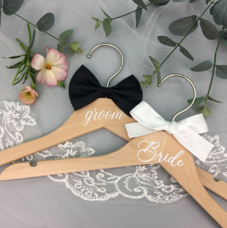 Wedding Hangers as Sustainable Gifts: Wooden Props for Eco-Conscious Brides