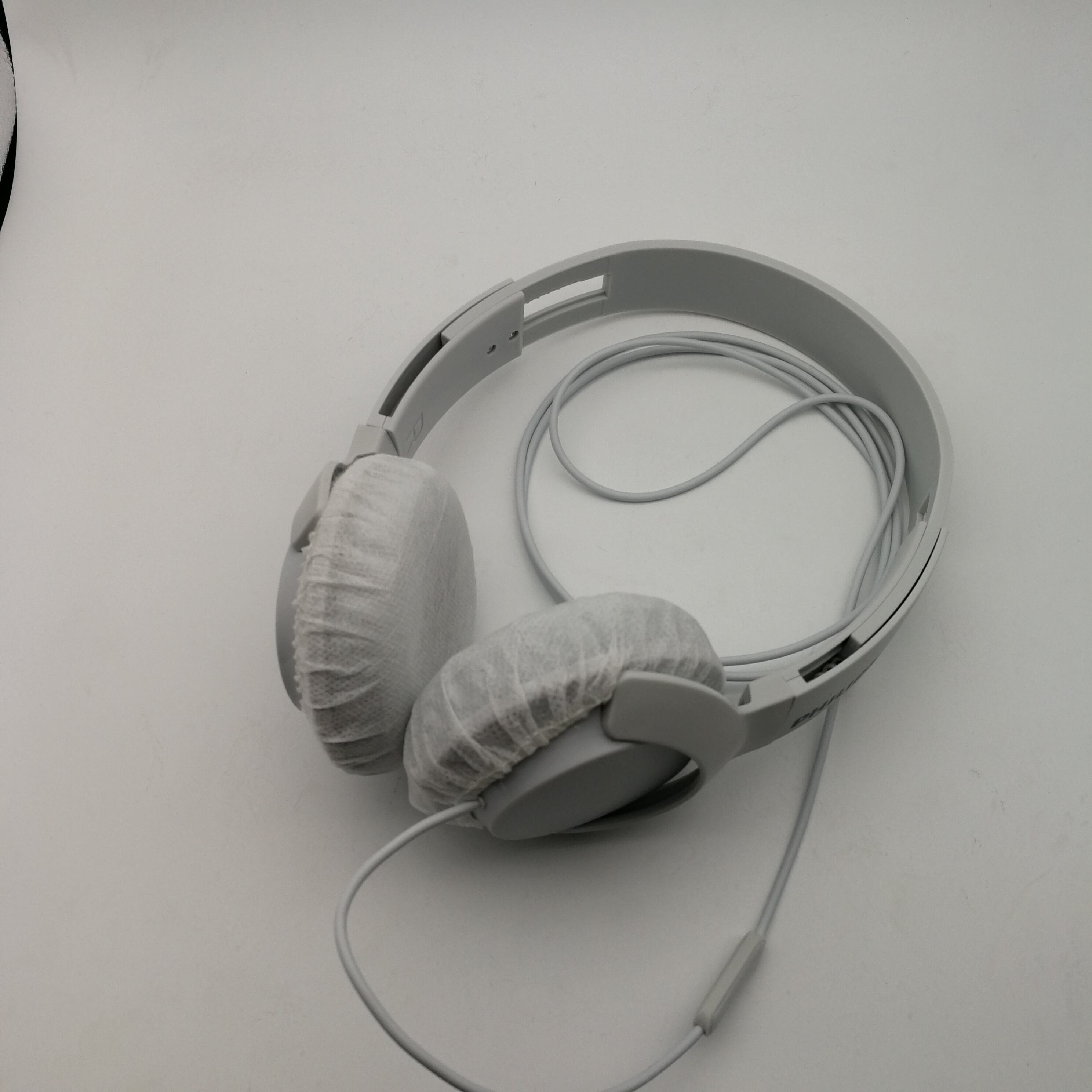 Why clean hands first when using disposable headphone cover?
