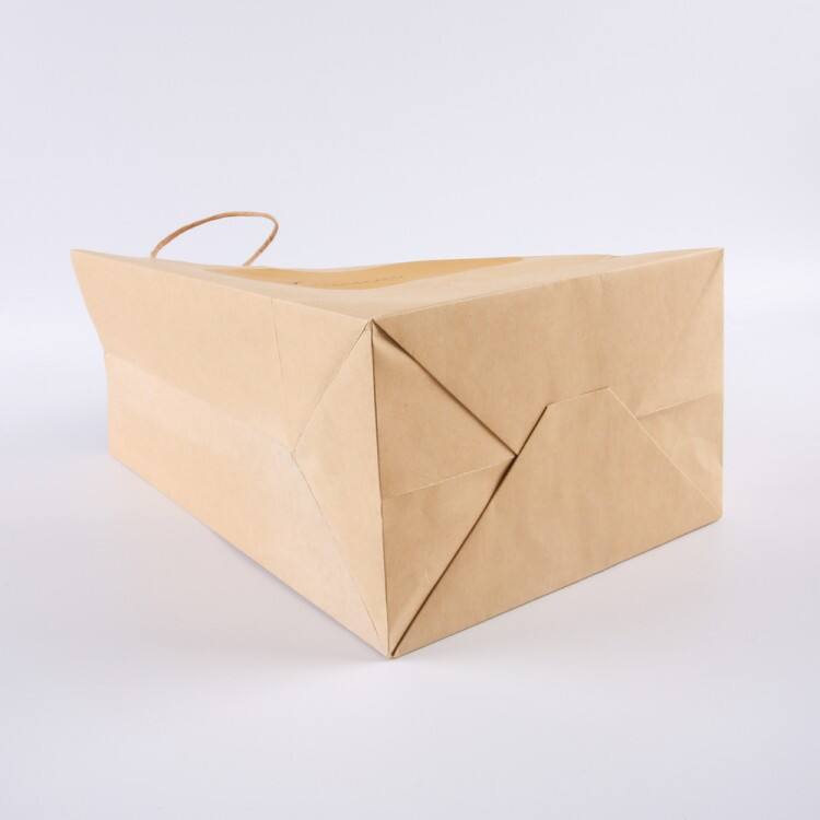 Milieuvriendelijke, op maat gemaakte klassieke kraftgeschenkverpakking van bruin papier, afhaalboodschappentas met handvatten