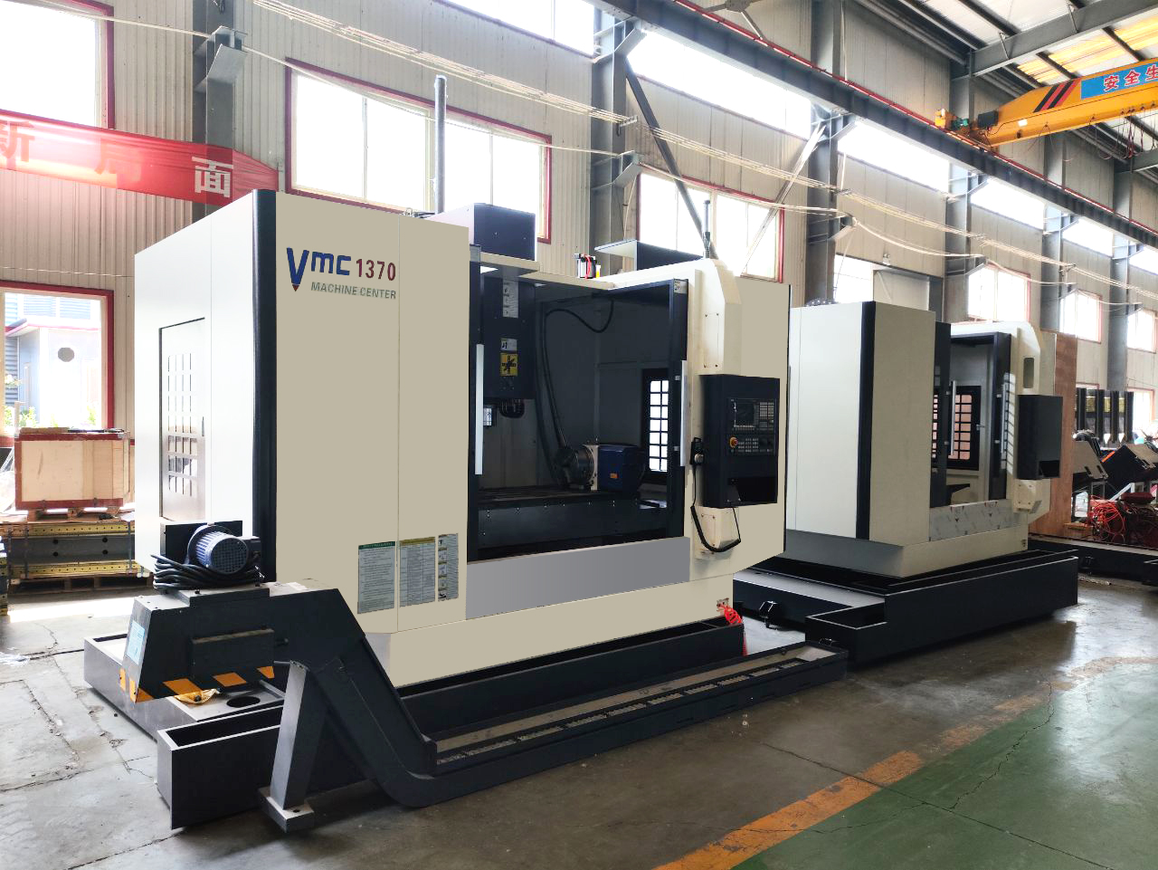 How do vertical CNC machining centers boost batch production?