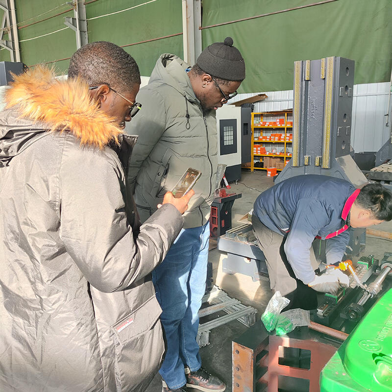African customers inspect the production process