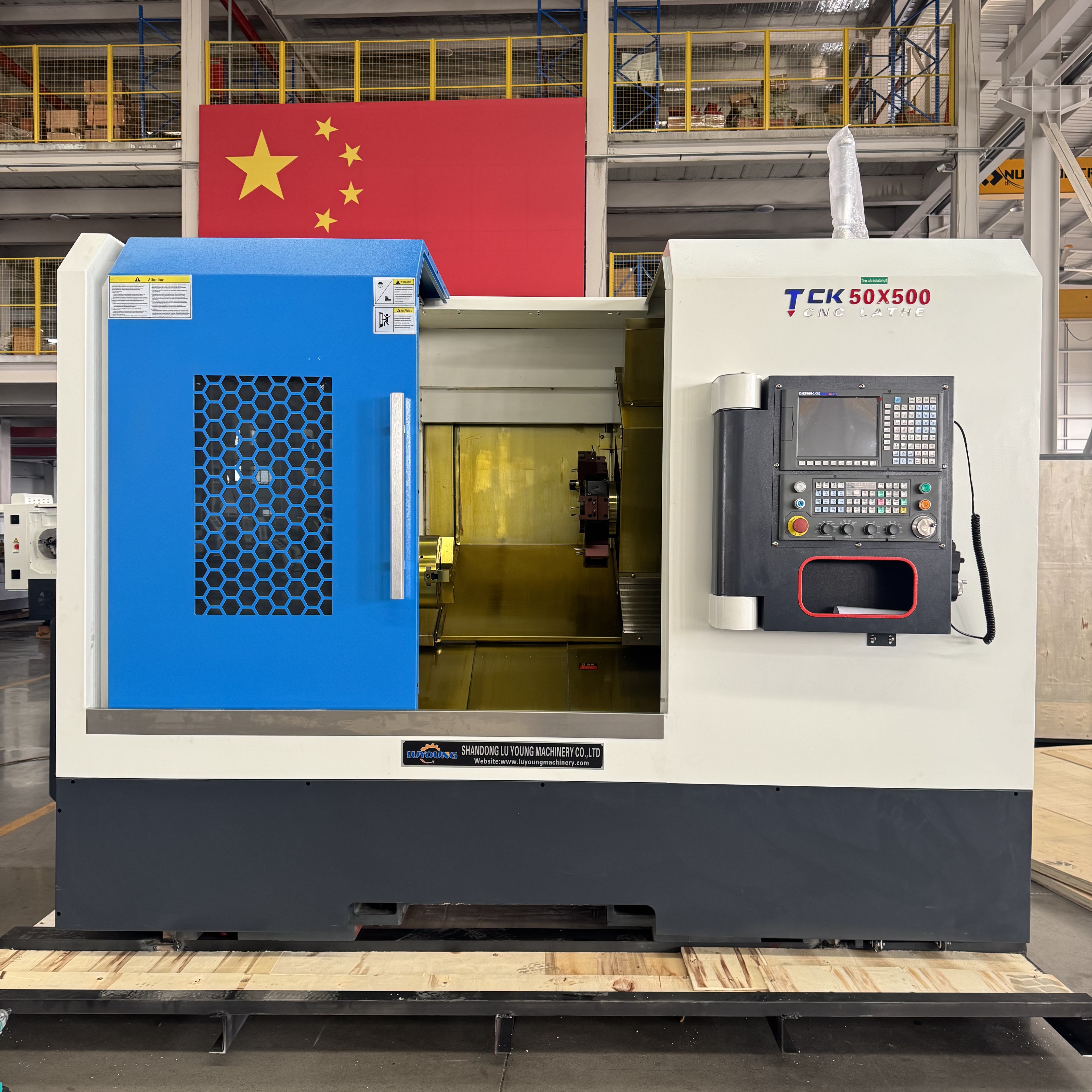 What advantages do slant bed CNC lathes offer for precision?