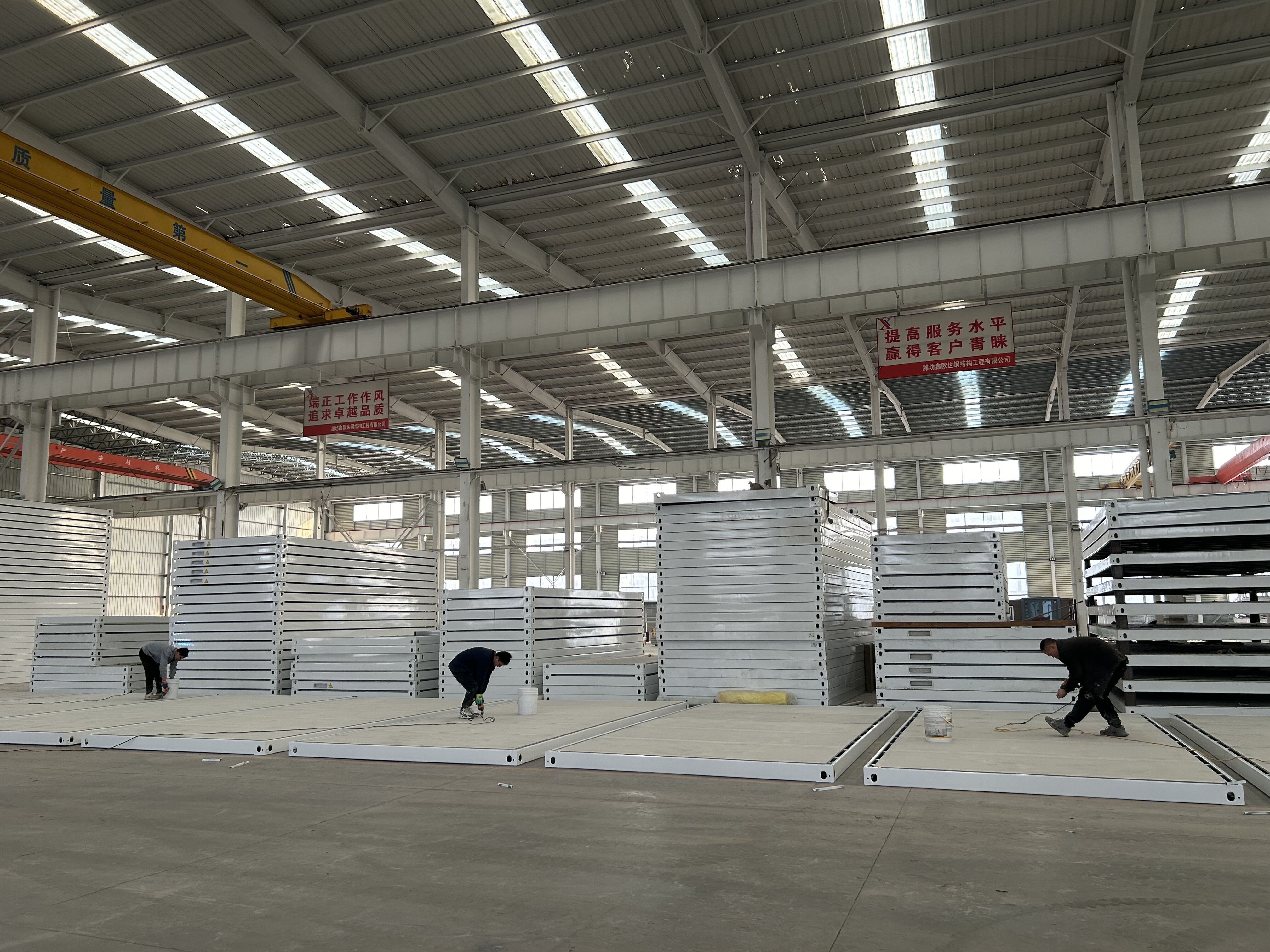 Overseas Clients Visit XINOUDA Factory – Discover Reliable Packaged Container House Manufacturing in China