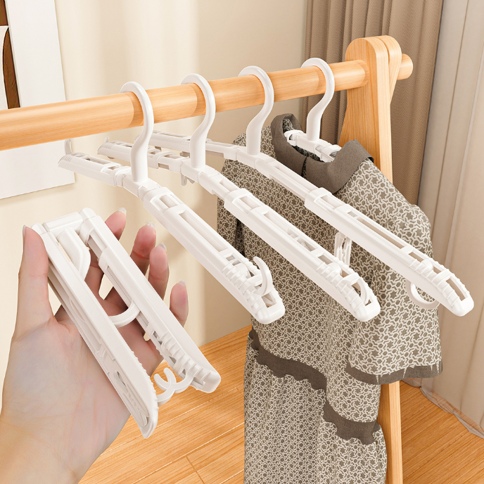 Travel folding simple telescopic clothes hanger