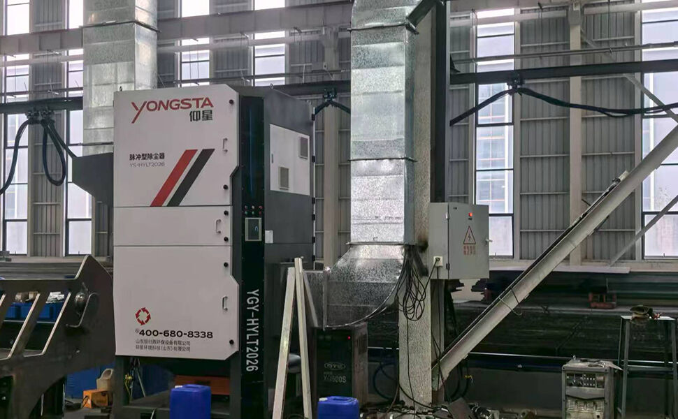 Sistema di raccolta fumi e polveri da saldatura per fabbrica di macchine edili