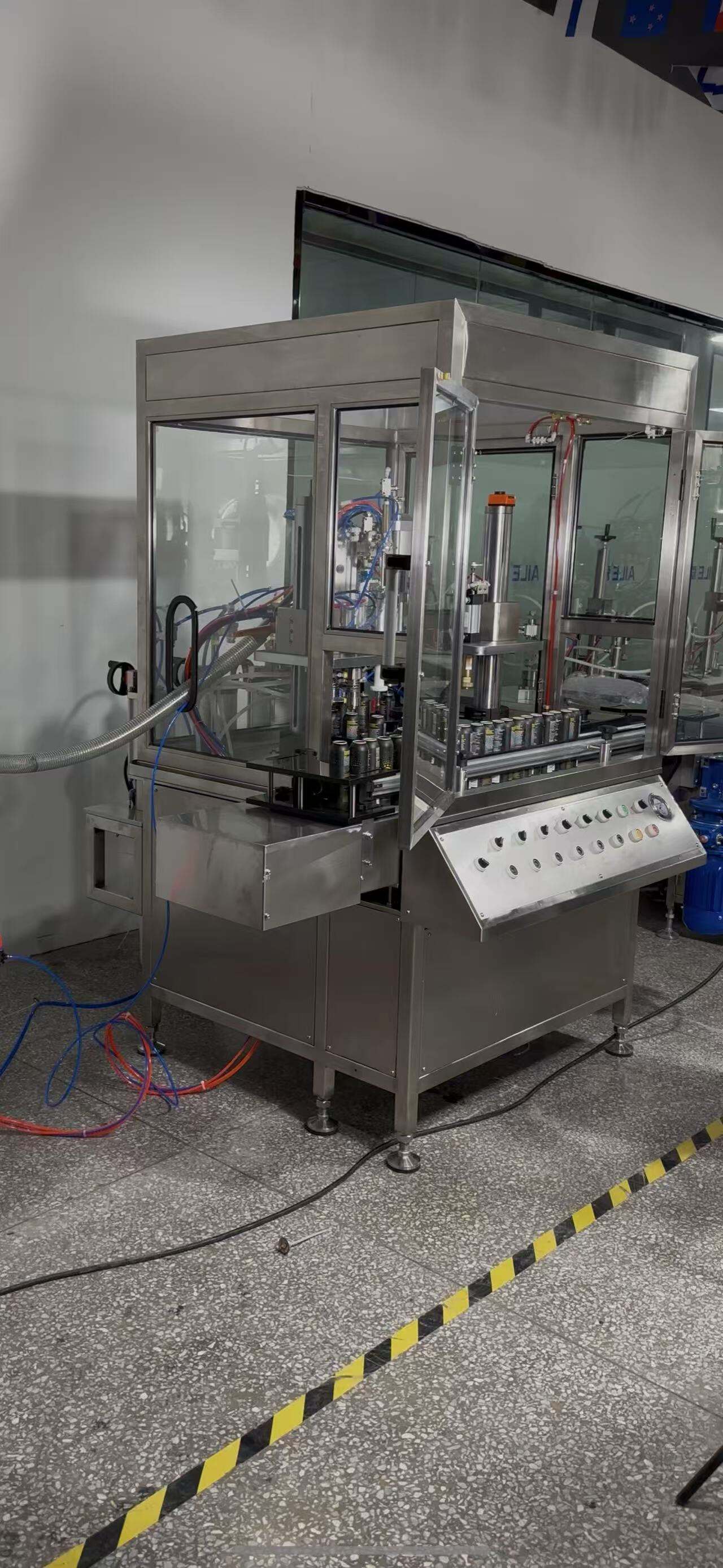 High-speed rotary aerosol filling machine for personal care and cosmetic sprays