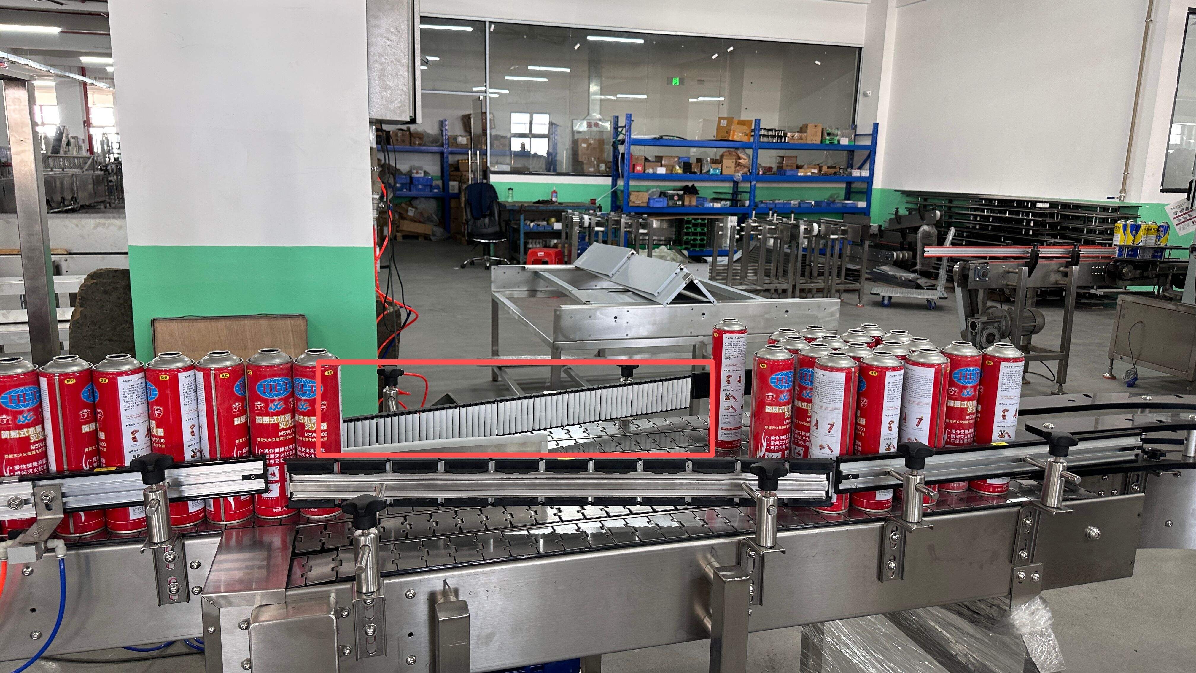 Ball-Driven Aerosol Can Pushing System