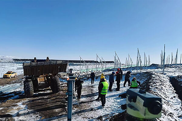 Workers Brave First Snow to Ensure Solar Project Progress
