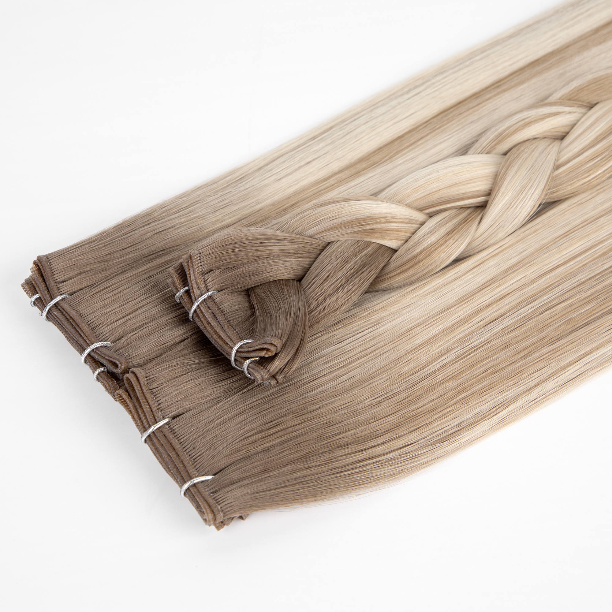 What features make genius weft hair extensions a game - changer in the industry?