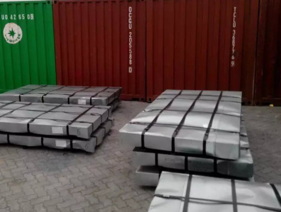 What are the common steel grades for steel angles in construction?