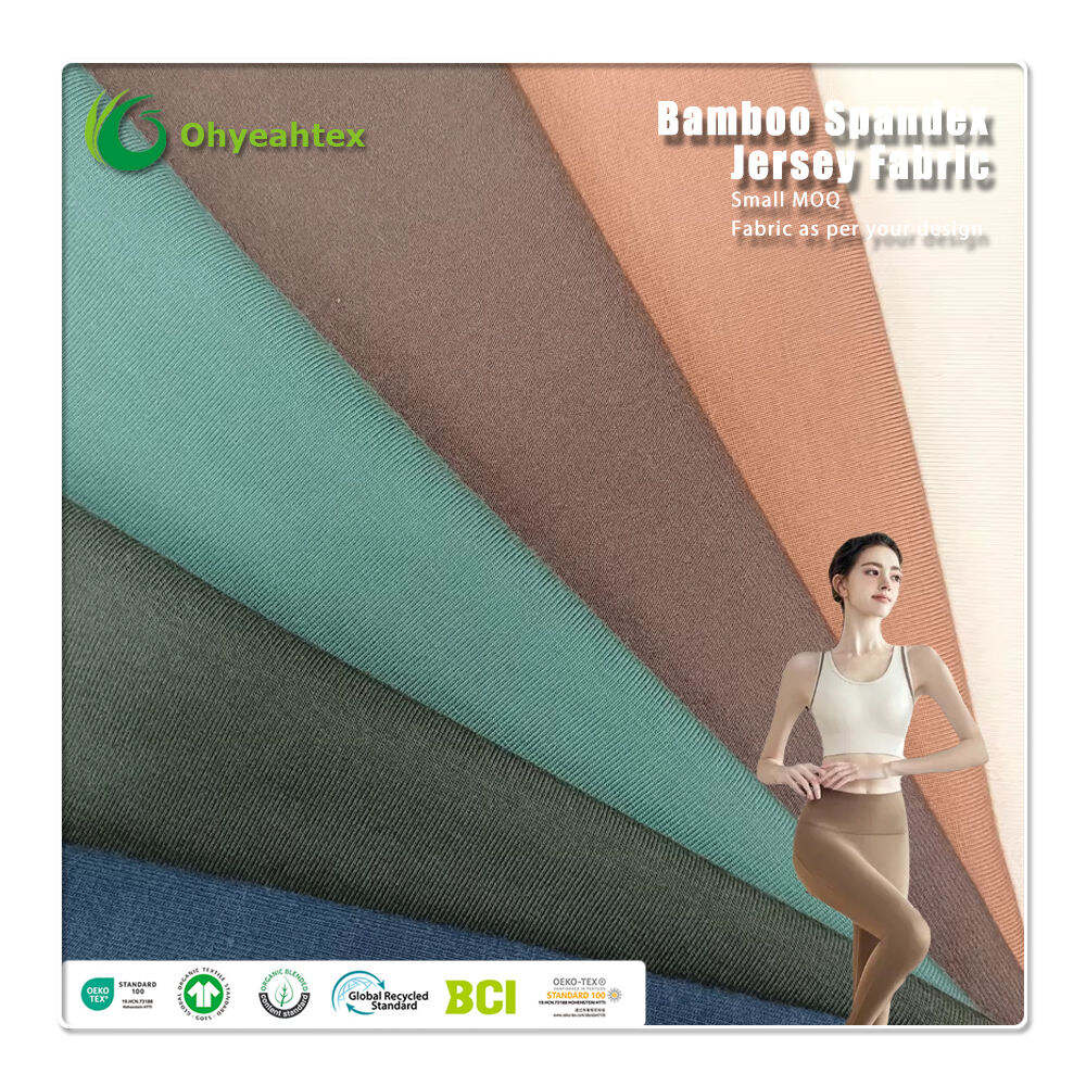 På lager ekologisk stretch 340 GSM bambu och ekologisk bomull jerseyväv för flickors sportkläder