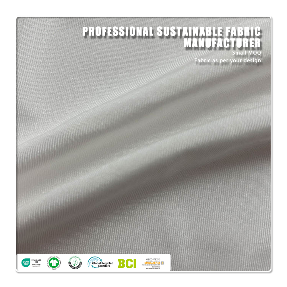 Snabbtorkande, miljövänlig stretchpolyesterstickad tyg med spandex, fuktavvisande och veckbeständigt för kläder och sportkläder