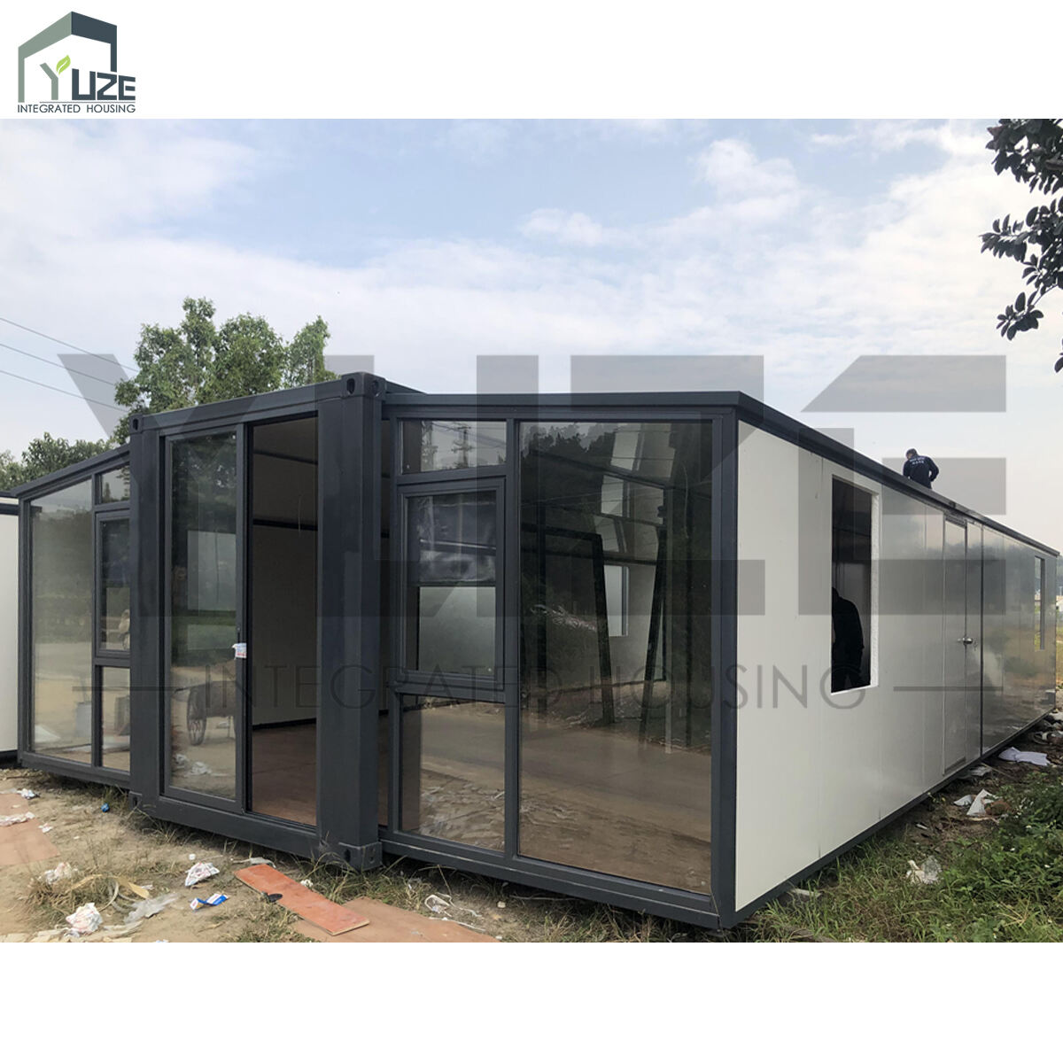 40FT Expandable Container Home with Double Sliding Glass Door and Modern Grey Exterior Design
