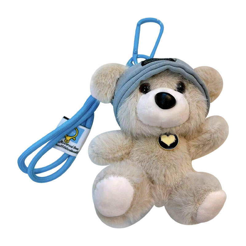 سلسلة مفاتيح دمية محشوة على شكل دب بقبعة، تعليقة دب تحمل حقيبة ظهر، هدية آلة القبض على الدمى من قماش