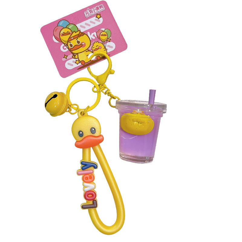 Genuine cute sports vitality little yellow duck keychain pendant fashion bag car key accessories.