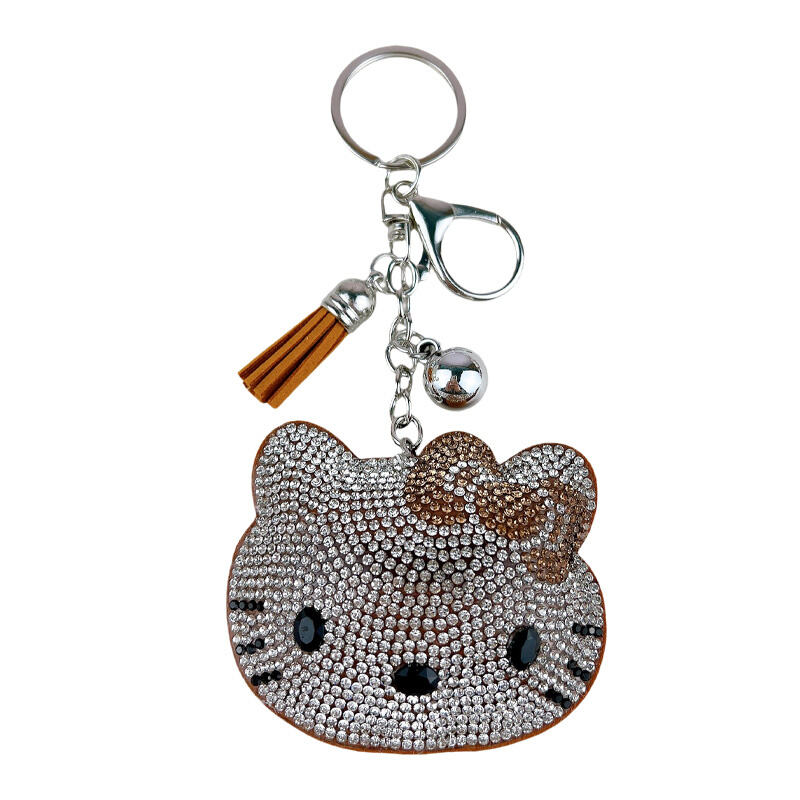 Breklok z kryształkami Swarovski Hello Kitty z frędzlami – urocliwa ozdoba do torebki