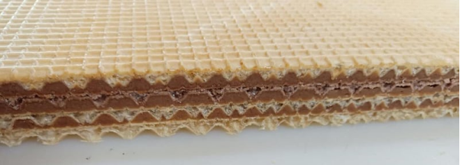 Ultrasonic food cutting , low friction cutting surface can cleanly slice many food products without debris manufacture