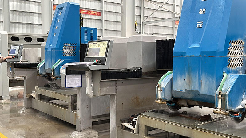 CNC stone cutting and profiling machines in a factory, used for precision processing of curved and irregular stone workpieces.jpg