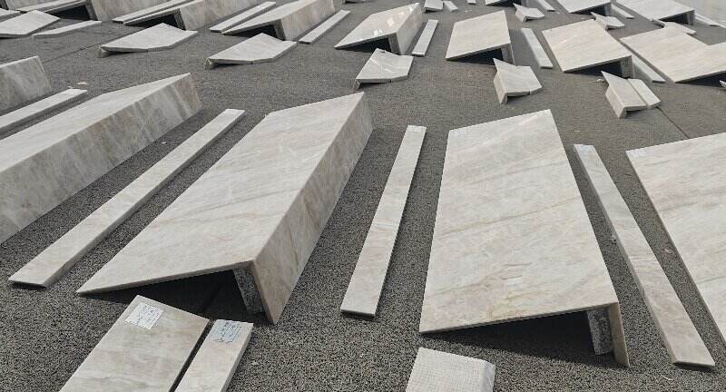 Precision-crafted mitered edge on a Taj Mahal Quartzite countertop by YDSTONE.jpg