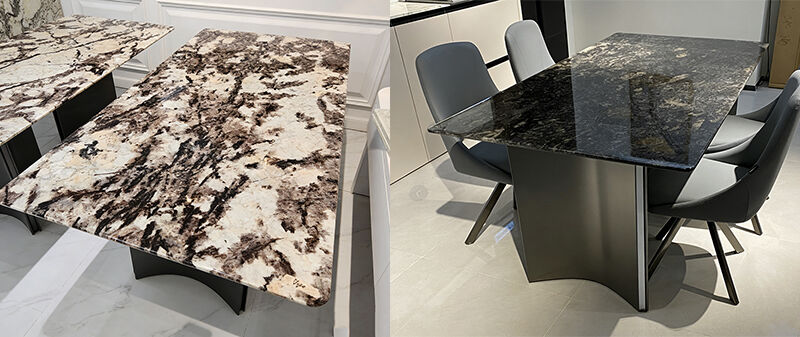 Modern marble dining table with black and white veined patterns, designed for indoor dining areas with sleek black table legs.jpg