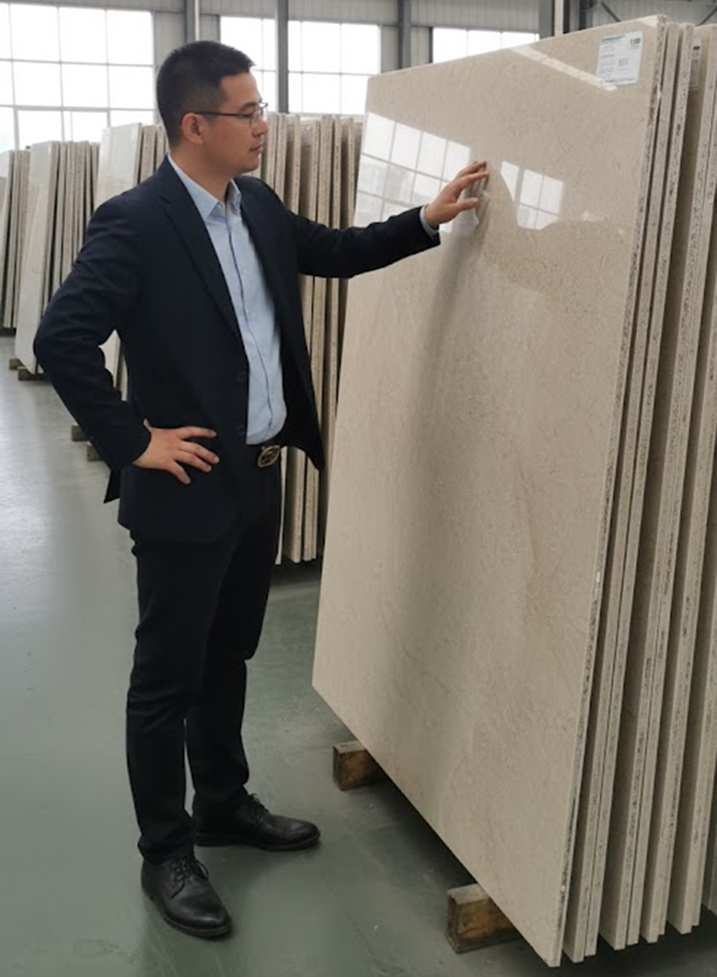 Dawson from YDSTONE selecting premium-grade Taj Mahal Quartzite slabs for international projects.png