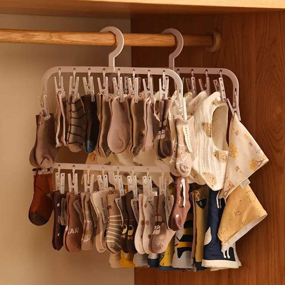 What are the tips for using plastic hangers to prevent clothes from slipping?
