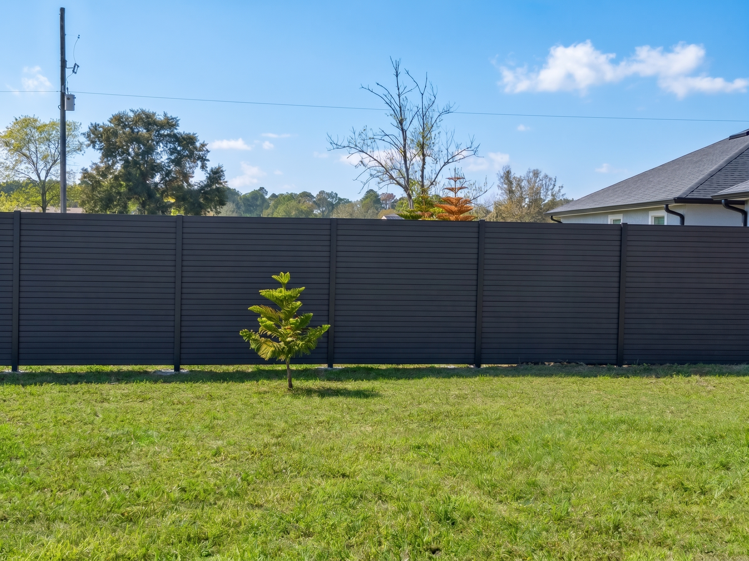 Black AM60 WPC Fence Installation – Architectural Impact with Long-Term Performance
