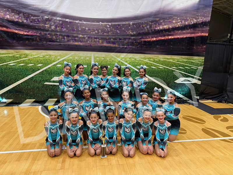 NG Team Stuns in Turquoise Competition Uniforms