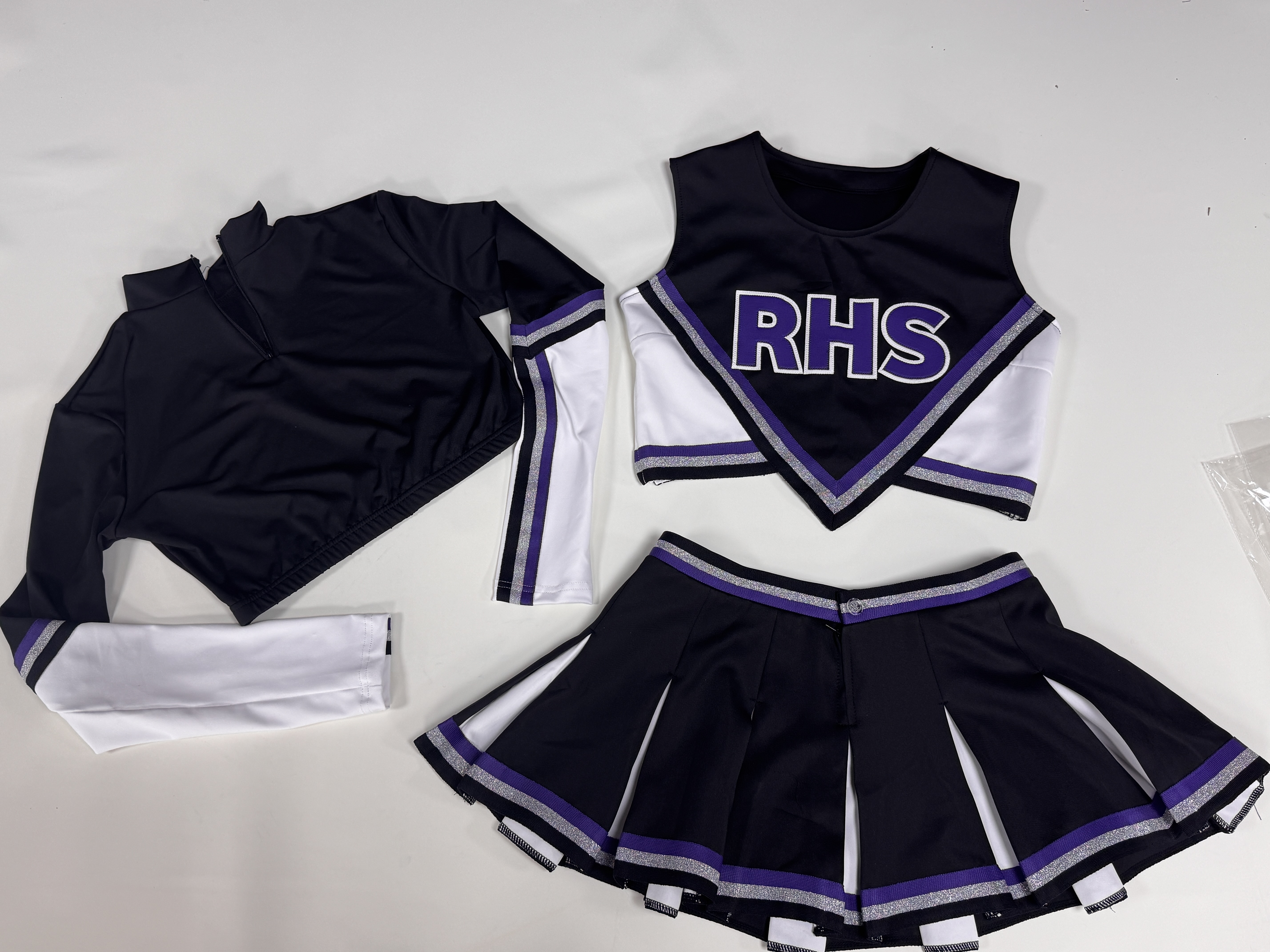 Neşeli takımlar için plitli eteklerin uygun fiyatlı toplu siparişleri