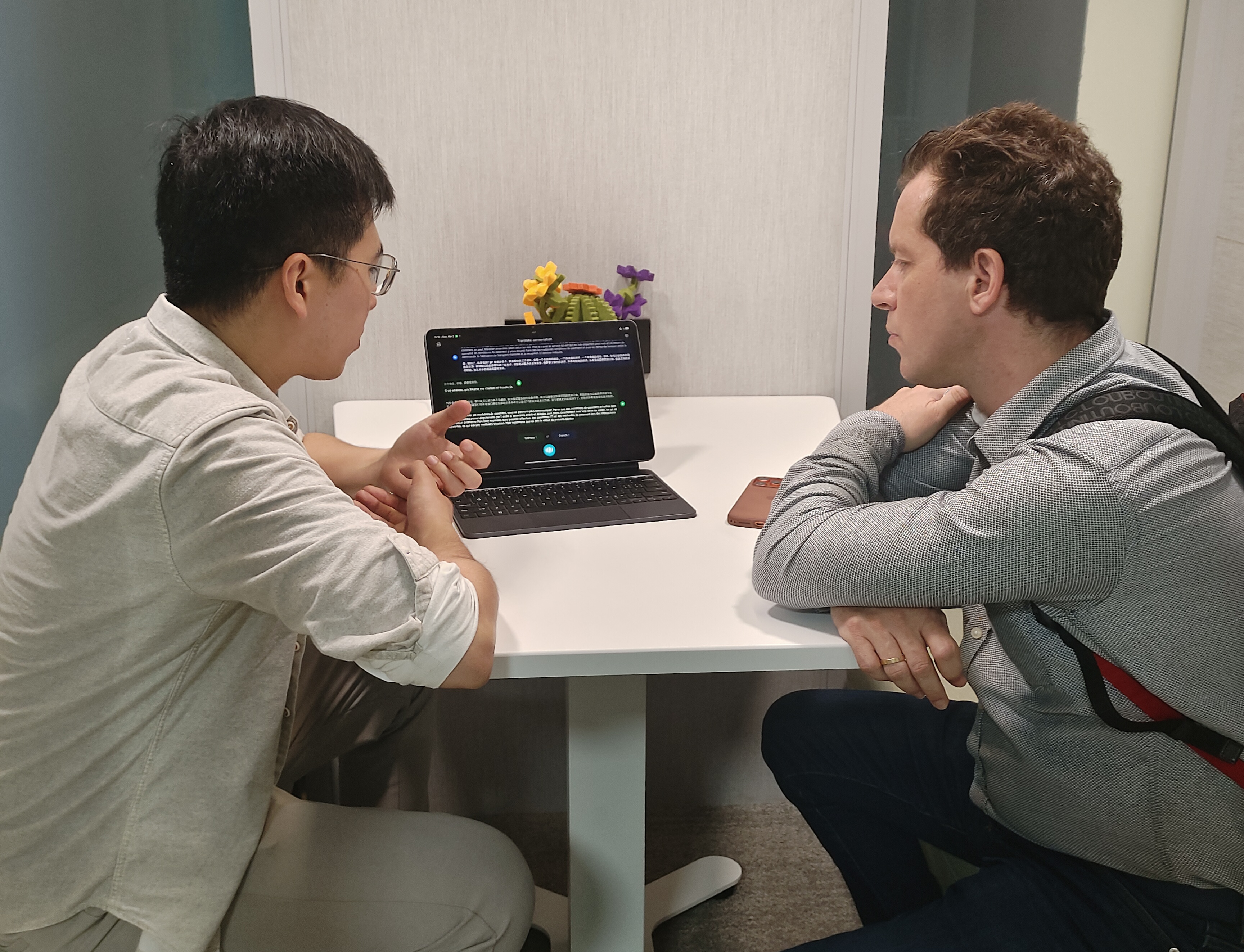 Discussion in soundproof booth.png