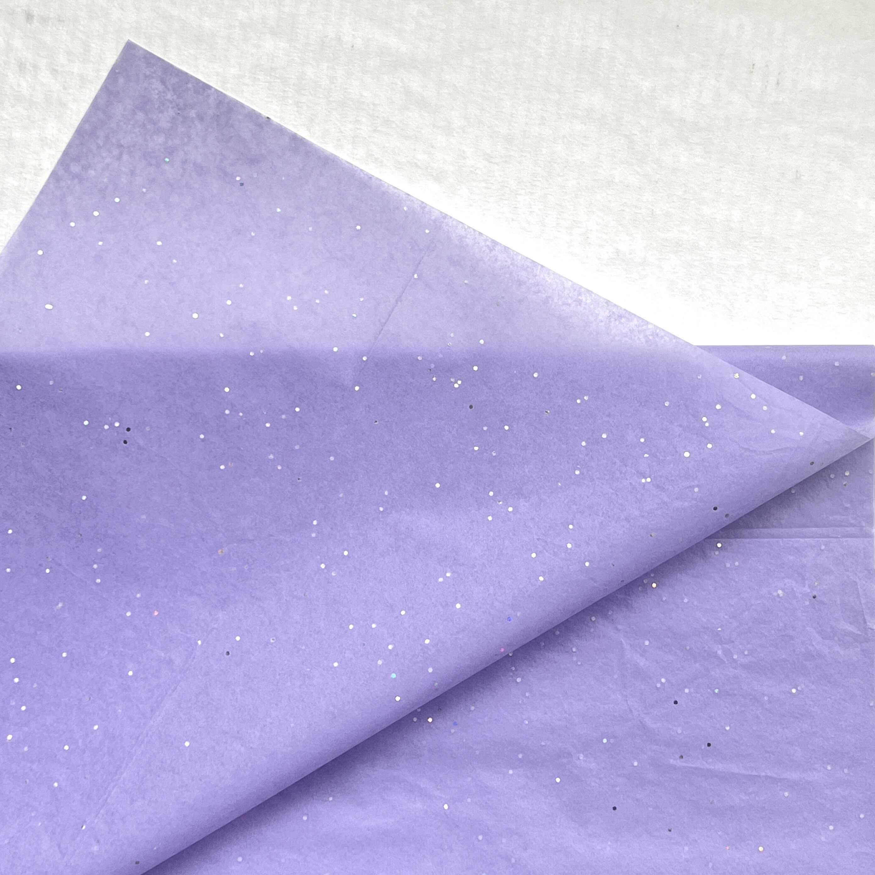 Forhøj dit gavepresentationsniveau med pastelblomstresklædepapir