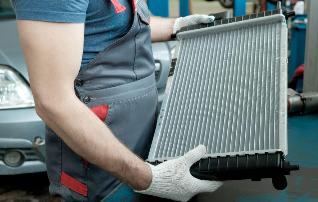 Is car radiator the same as condenser?