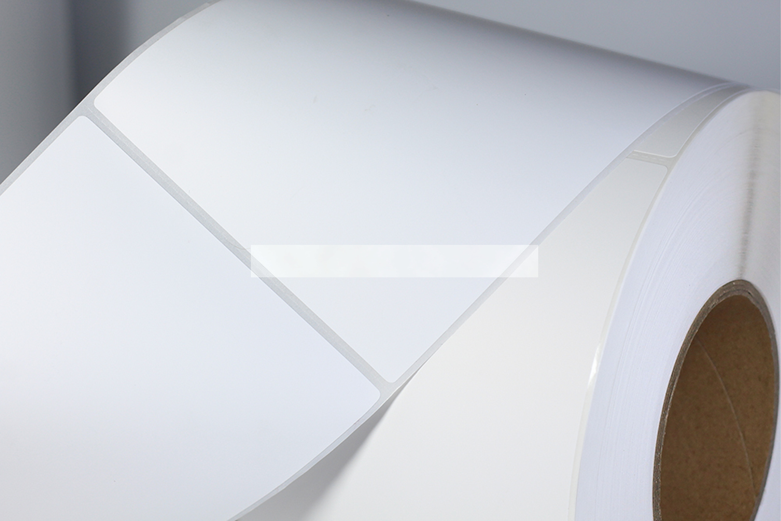 75 Micron White Synthetic Self Adhesive Paper Jumbo Label Film PP Synthetic Paper Label Jumbo Roll3.png