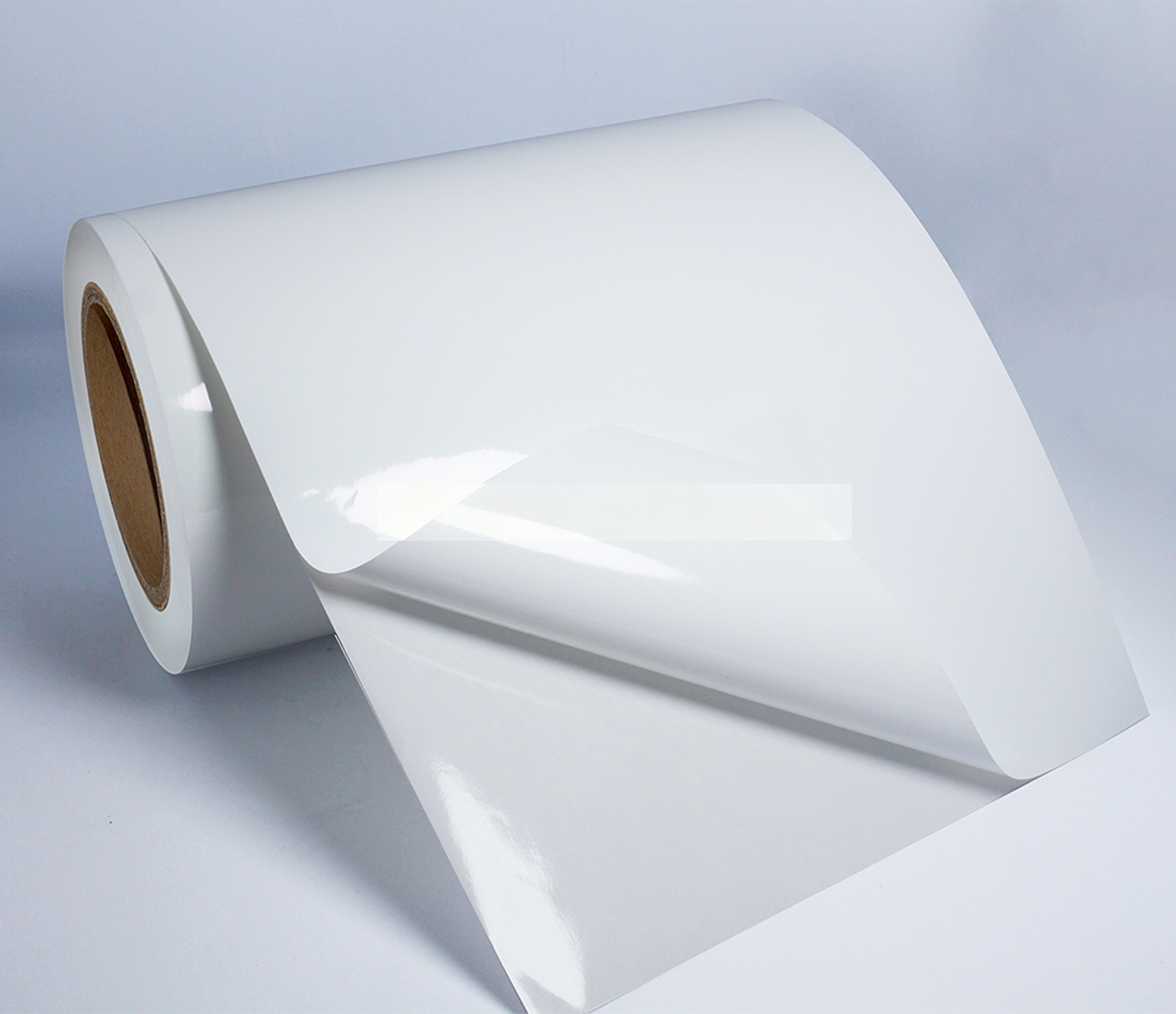 Self Adhesive Synthetic Glossy Paper Label Polyester PET White Film Label Paper Jumbo Roll2.png