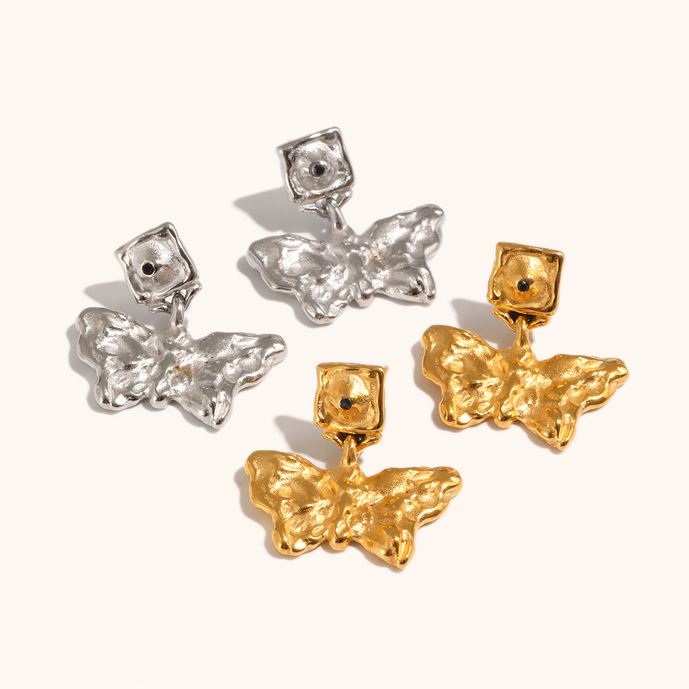 baguette zircon twisted gold plated huggie earring-5