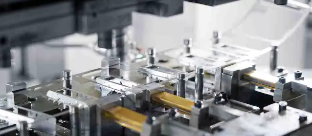 quality inspection station ensuring precision standards in progressive die manufacturing