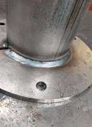 robotic welding cell for repeatable automotive assemblies