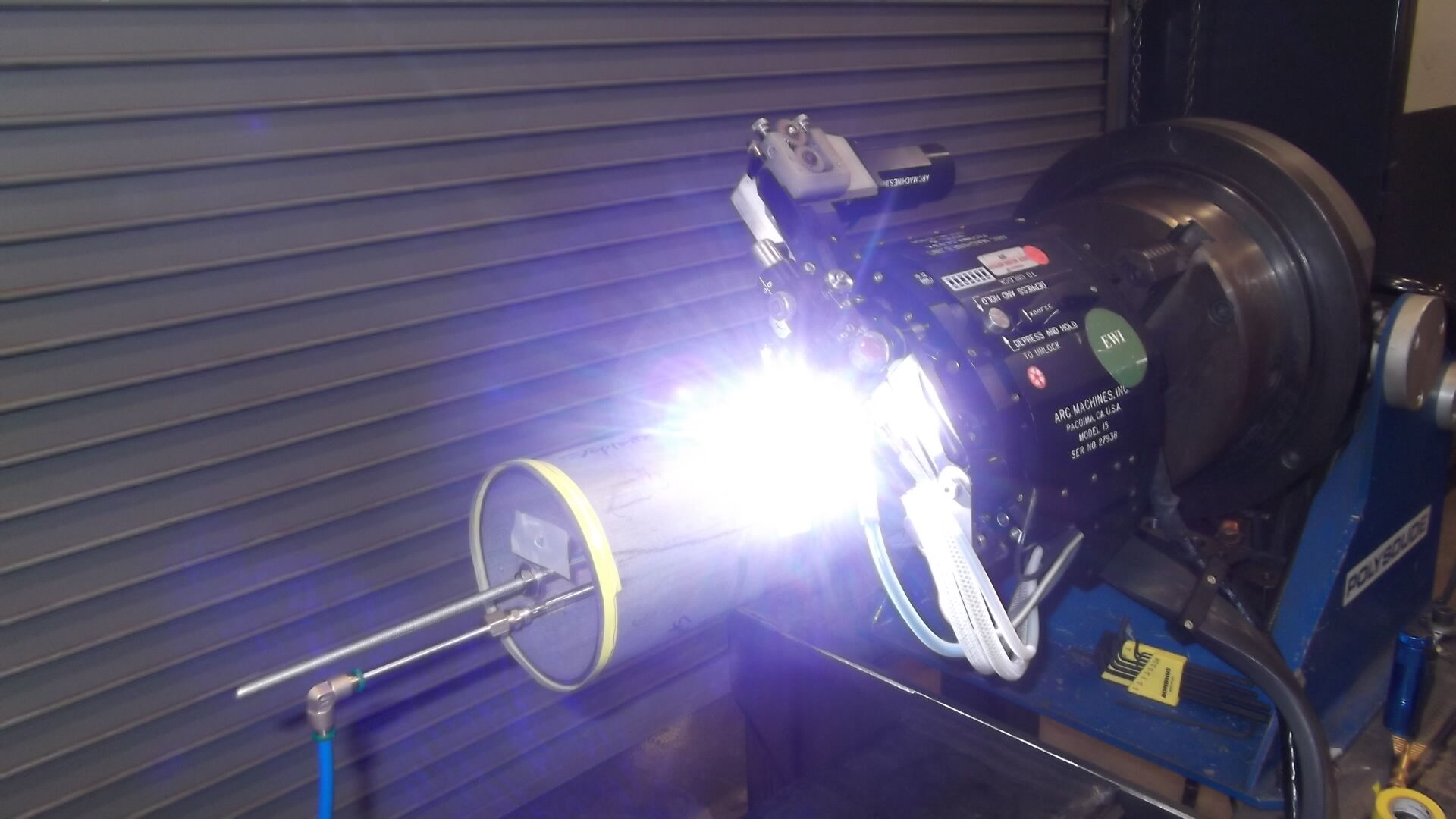 orbital welding system producing a clean tube weld in a controlled industrial setting