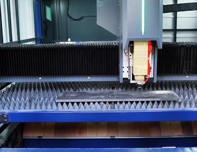 architectural laser cut metal panel creating decorative shadow patterns in commercial space