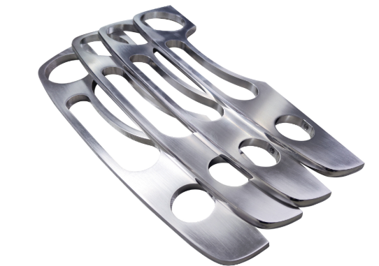 design for manufacturability principles showing proper bend radii and hole placement for stampable parts