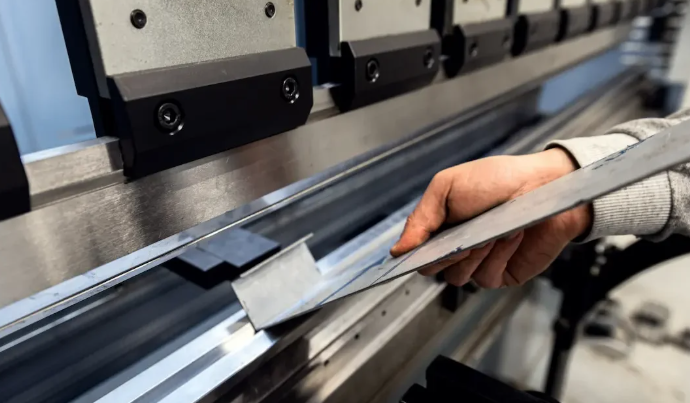 cnc press brake forming operation demonstrating precision bending of sheet metal components