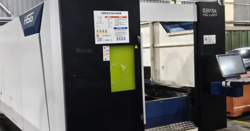 quality inspection of precision laser cut aluminum components at manufacturing facility