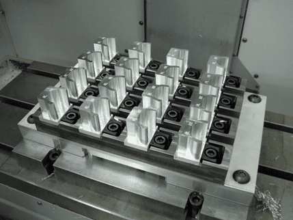 custom modular workholding system securing an oversized machined component