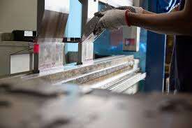 cnc press brake achieving precision angular tolerances in sheet metal forming