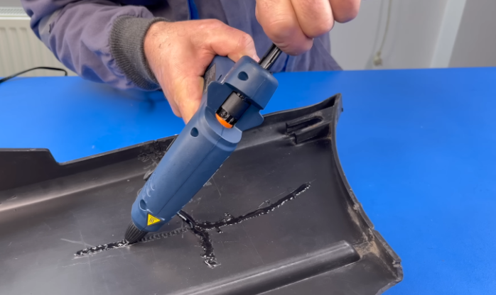 plastic welding repair with a hot air welder and matching filler rod