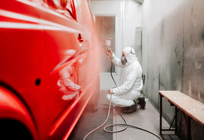 consistent spray technique helps build smooth even color on a car panel