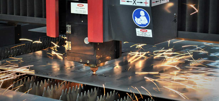 fiber laser cutting machine creating precise cuts in steel sheet metal